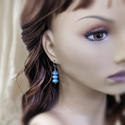 Blue Artisan Czech Glass Stacked Rondelle Earrings with Antiqued Silver Filigree photographed on a mannequin