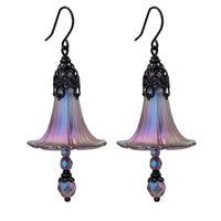 Handmade Iridescent Lucite Flower Earrings in Dark Color Shifting Purple, Fuchsia and Blue, with Gothic Victorian Style Black Metal Filigree photographed on a white background